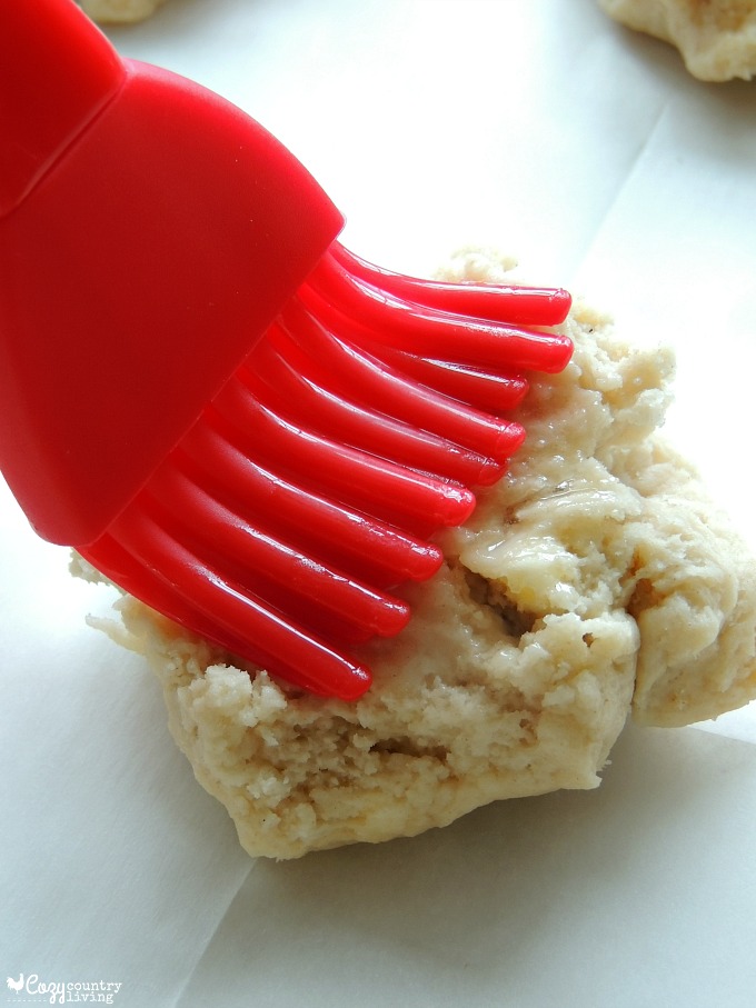 Brushing Butter On Top of Homemade Shortcakes