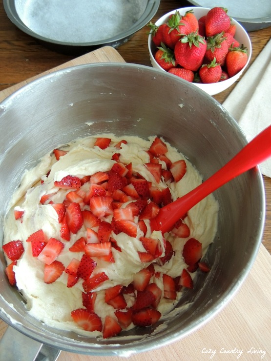 Mix fresh berries into the cake batter