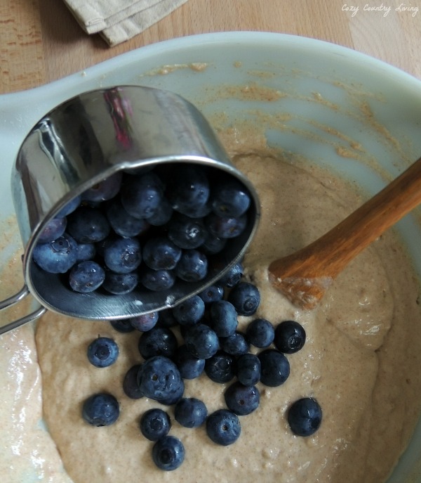 Mix fresh blueberries into batter