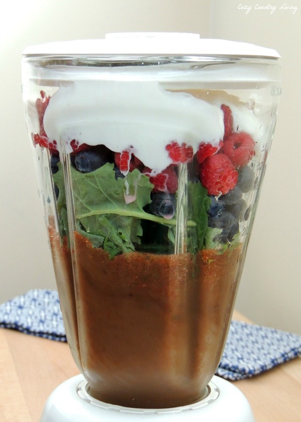 Blending the Triple Berry Kale Smoothie