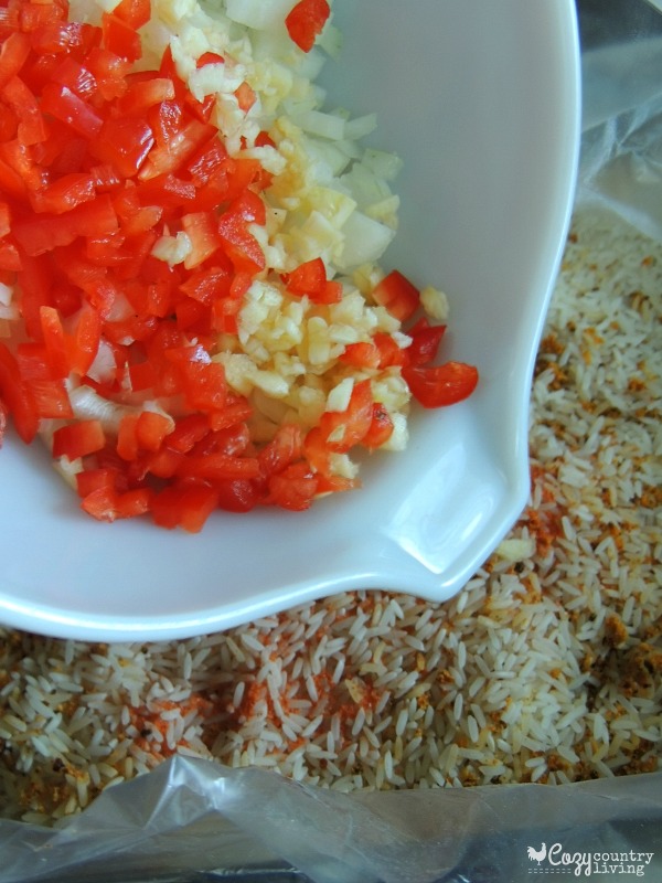 Add the Rice, Seasoning, Onion, Garlic & Pepper