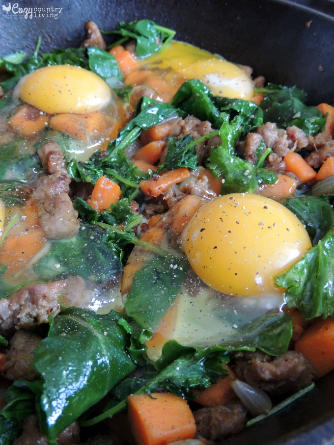 Adding Eggs to Kale, Sausage & Sweet Potatoes