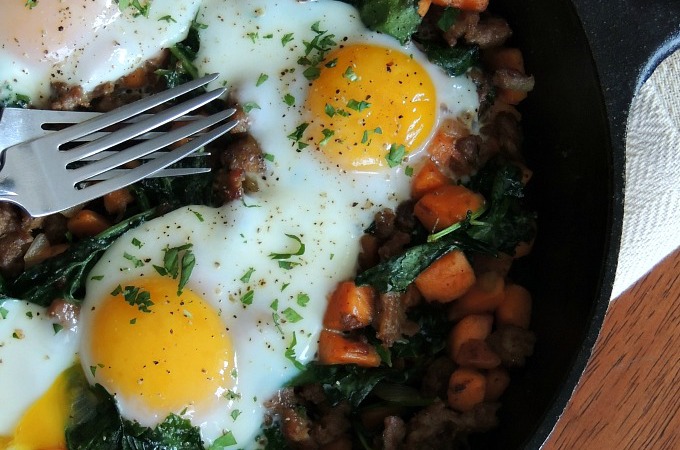 Skillet Baked Eggs with Sausage, Kale & Sweet Potatoes
