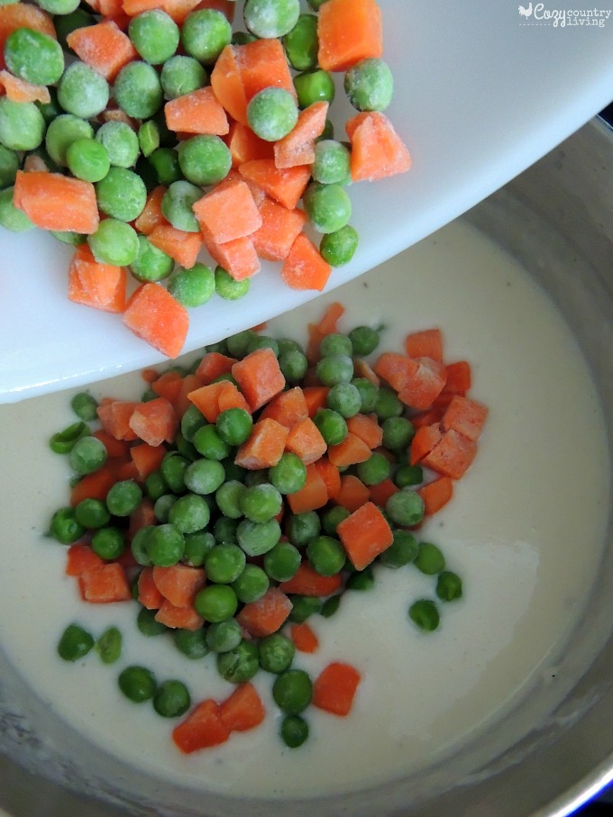 Adding Peas and Carrots to Cheese Sauce