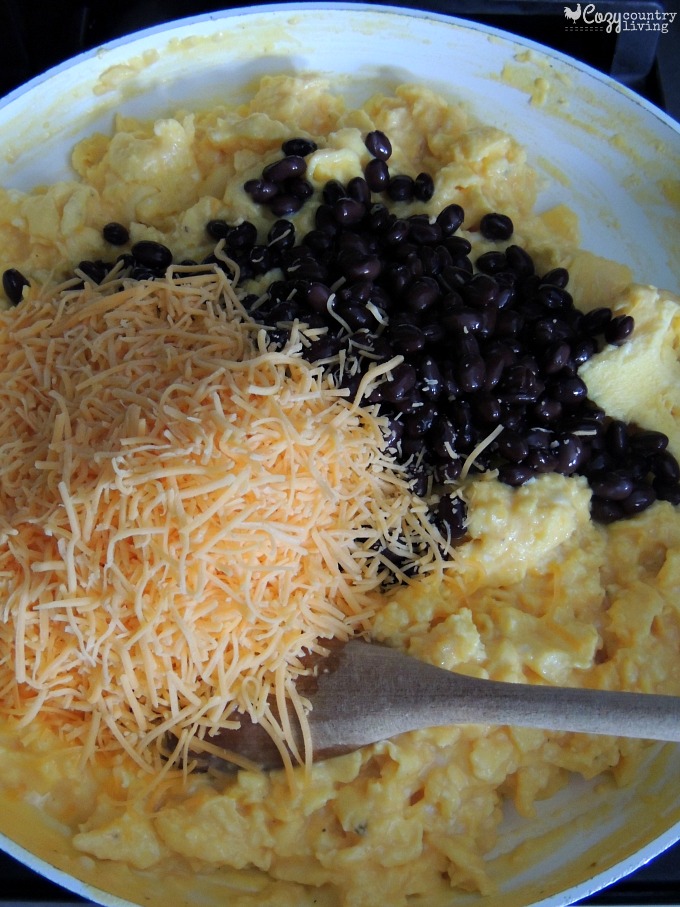 Adding Cheese Beans to Breakfast Burritos