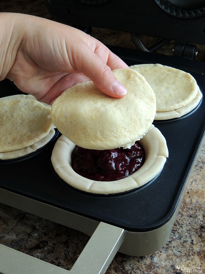 Adding Top Crust to Mini Mixed Berry Pies