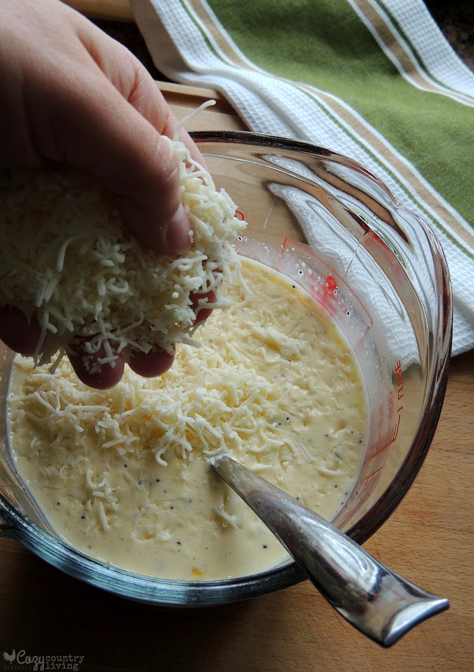 Adding Italian Cheeses to Egg Mixture for Quiche