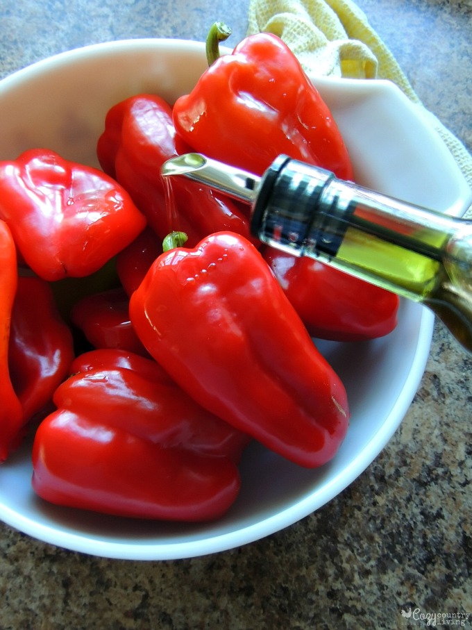 Drizzling Olive Oil Over Red Peppers