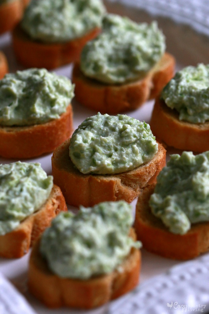 Topping Crostini with Cheese & Asparagus Mixture