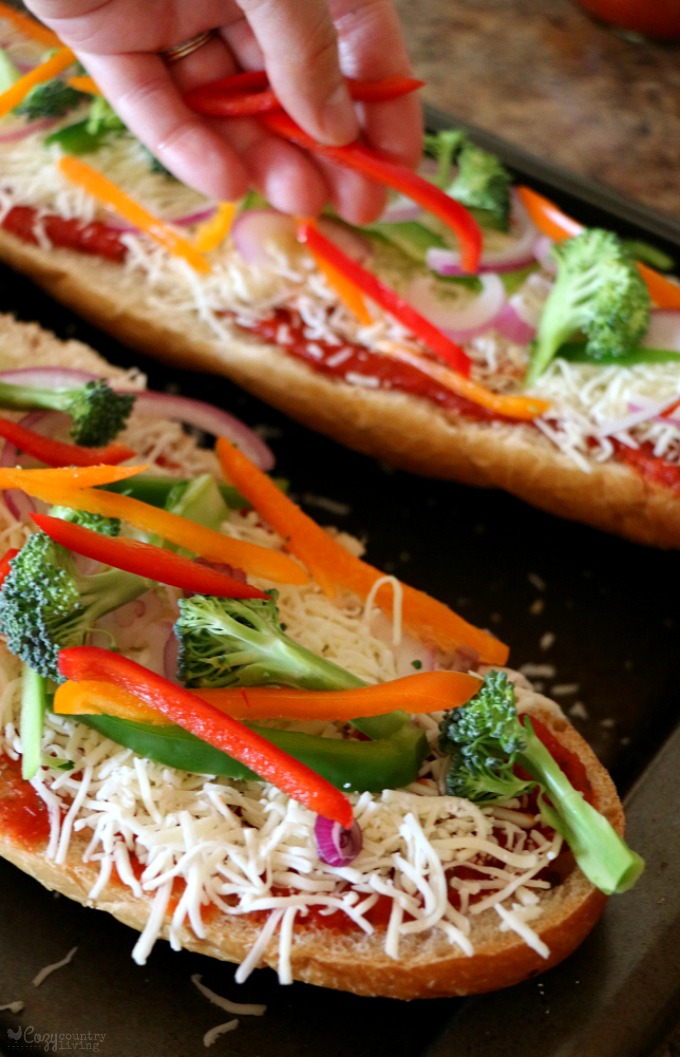Adding Vegetables to French Bread Pizza
