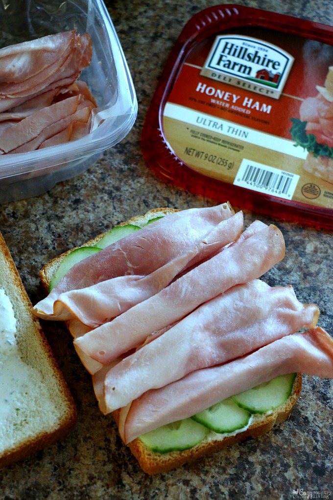 Adding Honey Ham to Sandwich