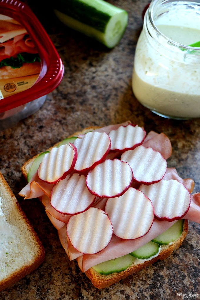 Adding Radishes to Sandwich